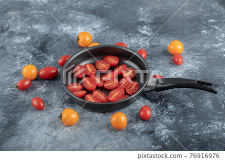 Fresh half cut or whole cherry tomatoes Fresh half cut or whole cherry tomatoes 76916976