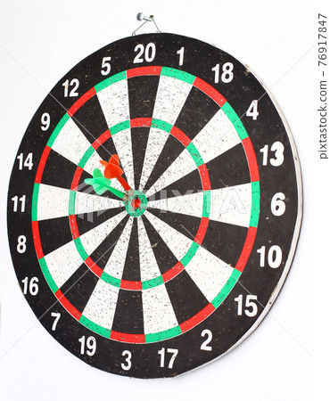 side view.Arrow dart hitting the center of the target dart Board side view.Arrow dart hitting the center of the target dart Board 76917847