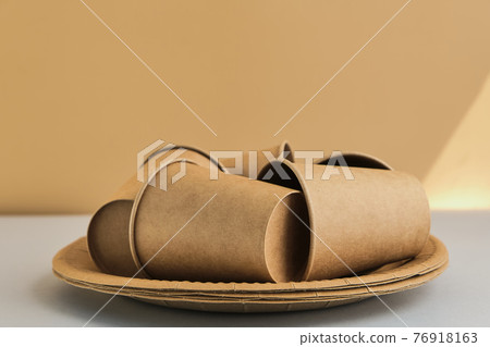 Recycling symbol as a conceptual symbol, made from disposable cardboard glasses 76918163