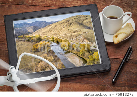 river in mountain canyon aerial view 76918272