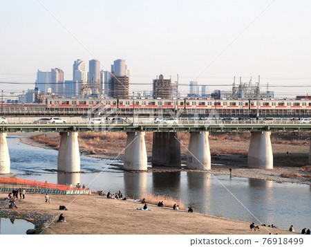 Tokyu Denentoshi Line crossing the Tama River 76918499