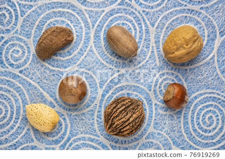 variety of nuts in shells variety of nuts in shells 76919269