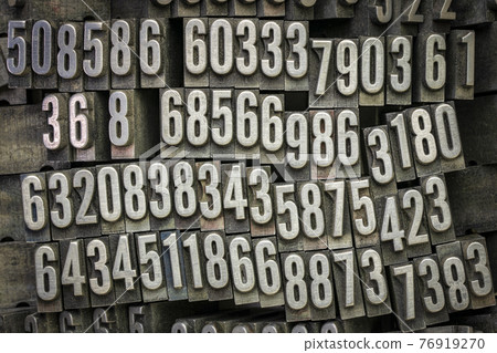 numbers in old, grunge, dusty letterpress metal typer 76919270