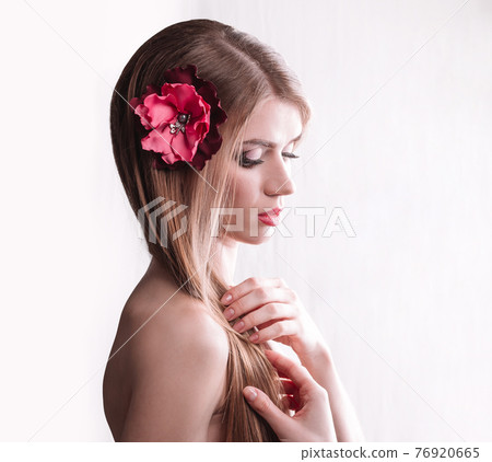 portrait of cute girl with long hair .isolated on light 76920665
