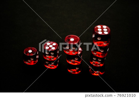 Dice black background 76921010