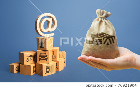 Money bag, stack of boxes and email internet symbol. Online Internet distribution of goods. E-commerce. Network marketing advertising. Remote non-contact trade services. Economic reorientation Money bag, stack of boxes and email internet symbol. Online Internet distribution of goods. E-commerce. Network marketing advertising. Remote non-contact trade services. Economic reorientation 76921904