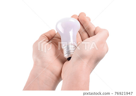 Bulb in hands on a white background Bulb in hands on a white background 76921947