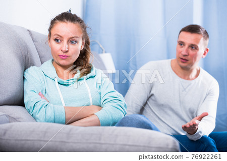Couple arguing at home Couple arguing at home 76922261