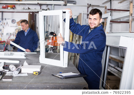 Young engineer is taking order from customer Young engineer is taking order from customer 76922395