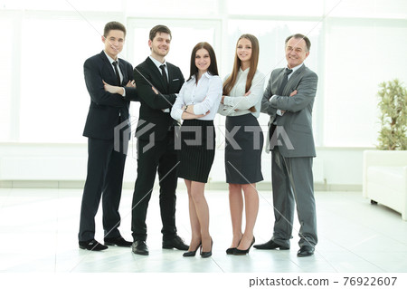 full growth.a group of successful business people full growth.a group of successful business people 76922607