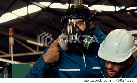 Skillful factory worker rescue his teammate out of poisonous gas leakage 76924156