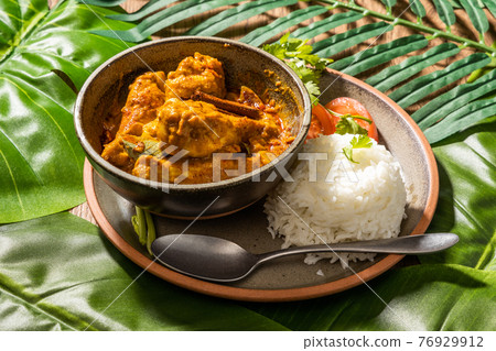 Chicken curry Asian style very spicy chicken curry 76929912