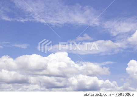 blue sky background with tiny clouds blue sky background with tiny clouds 76930869