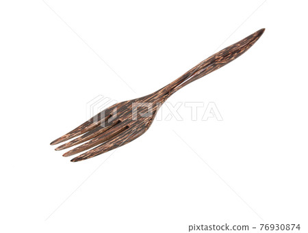 Wooden fork on white background Wooden fork on white background 76930874