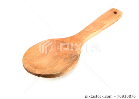 Wooden spoon isolated on white background Wooden spoon isolated on white background 76930876