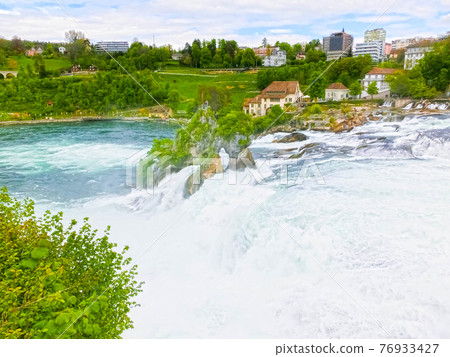 Largest waterfall in Europe by River Rhein in Switzerland 76933427