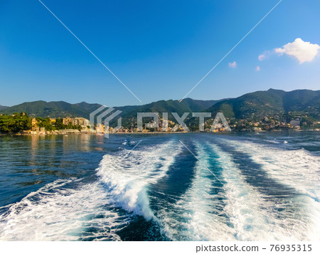 The sea view of town Rapallo in Liguria, Italy. The sea view of town Rapallo in Liguria, Italy. 76935315