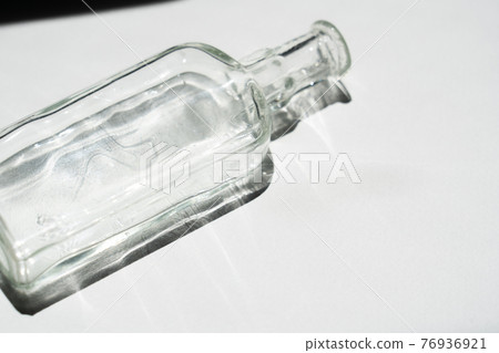 Glass bottle antique 76936921