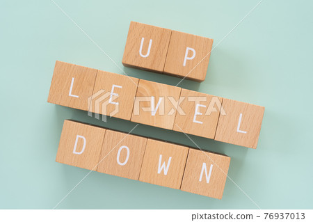 Level up, level down | Building block with "LEVEL UP DOWN" written on it 76937013