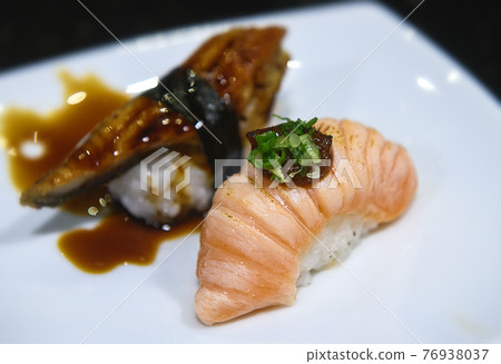 Japanese salmon belly slice and burn sushi. Japanese salmon belly slice and burn sushi. 76938037