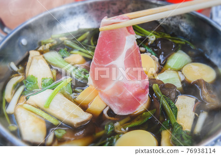 Hot soup vegetables and meats shabu style. Hot soup vegetables and meats shabu style. 76938114
