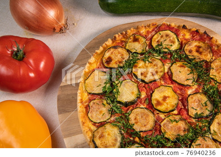 Vegetarian Provencal quiche recipe with vegetables, zucchini, tomato, pepper, onion, parsley 76940236