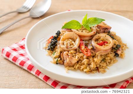 Basil and Spicy Herb Fried Rice with Squid or Octopus 76942321
