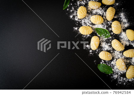 Traditional Italian gnocchi pasta - uncooked Traditional Italian gnocchi pasta - uncooked 76942584
