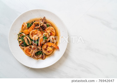 stir-fried seafood with Thai basil stir-fried seafood with Thai basil 76942647