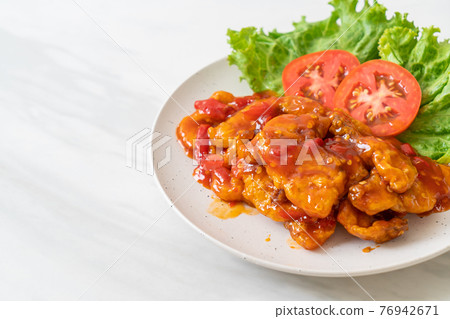Fried fish topped with 3 flavors chili sauce Fried fish topped with 3 flavors chili sauce 76942671