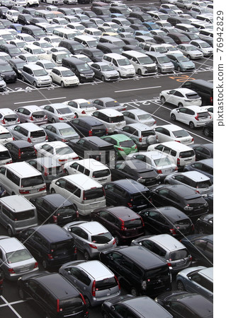 Lots of cars 76942829