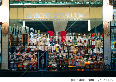 USA - october, 2019 Bottles of alcohol and spirits at a restaurant bar. USA - october, 2019 Bottles of alcohol and spirits at a restaurant bar. 76957489