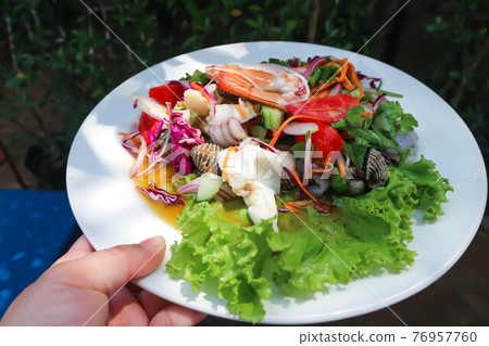 spicy salad or spicy seafood salad spicy salad or spicy seafood salad 76957760