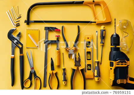 Workshop instrument, top view, yellow background 76959131