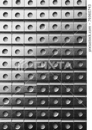 slide screw nuts in a row, abstract industrial background slide screw nuts in a row, abstract industrial background 76960743