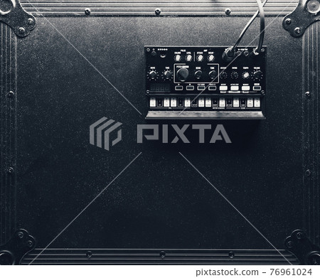 black analog synthesizer, top view black analog synthesizer, top view 76961024