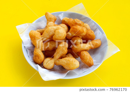 Deep-fried dough stick, chinese bread stick Deep-fried dough stick, chinese bread stick 76962170