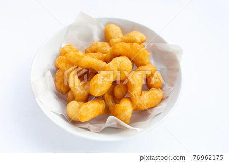 Deep-fried dough stick, chinese bread stick Deep-fried dough stick, chinese bread stick 76962175