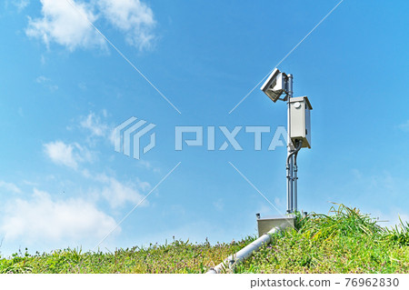 Water level measuring device installed in the river Water level measuring device installed in the river 76962830
