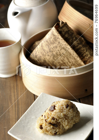 Steamed Chinese rice dumplings, Kyusu and tea Steamed Chinese rice dumplings, Kyusu and tea 76964699
