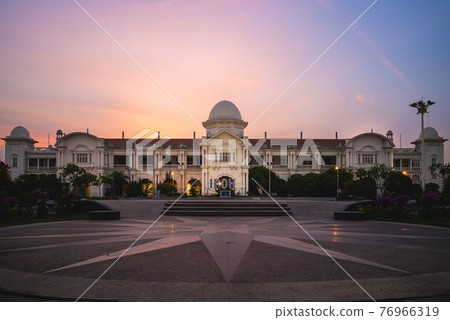 facade of ipoh railway station at dusk in ipoh city, malaysia 76966319