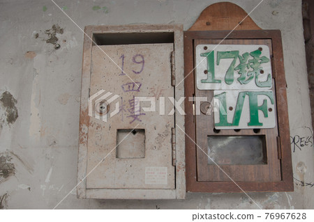 29 July 2007 a Classic foldding metal gate in Hong Kong old door. 76967628
