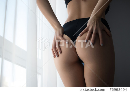 Crop woman with perfect buttocks Crop woman with perfect buttocks 76968494