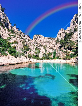 Rainbow over Calanque Bay Rainbow over Calanque Bay 76969028