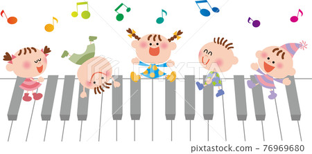 Children playing on the piano Children playing on the piano 76969680