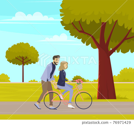 Guy teaches his friend to ride bike. Man supports woman on bicycle on date. People rest in nature 76971429