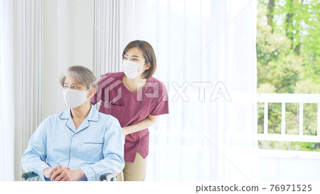Senior male key worker with a mask Senior male key worker with a mask 76971525