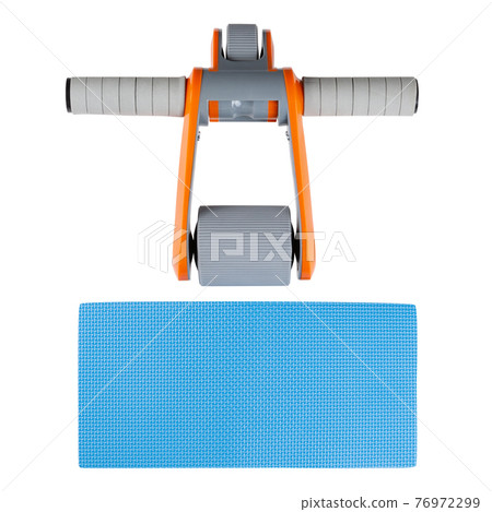 orange wheel for fitness, workout of abdominal muscles and muscles of the back, near the blue mat, on a white background, isolate orange wheel for fitness, workout of abdominal muscles and muscles of the back, near the blue mat, on a white background, isolate 76972299
