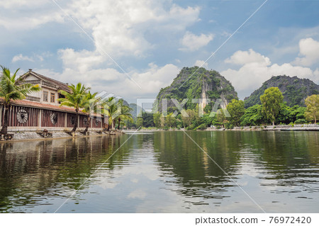 Trang An, Tam Coc, Ninh Binh, Viet nam. It's is UNESCO World Heritage Site, renowned for its boat cave tours. It's Halong Bay on land of Vietnam. Vietnam reopens borders after quarantine Coronovirus 76972420