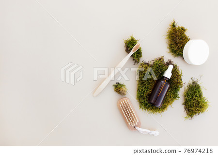 Bath accessories flat lay on beige background. Healthcare concept, green moss 76974218